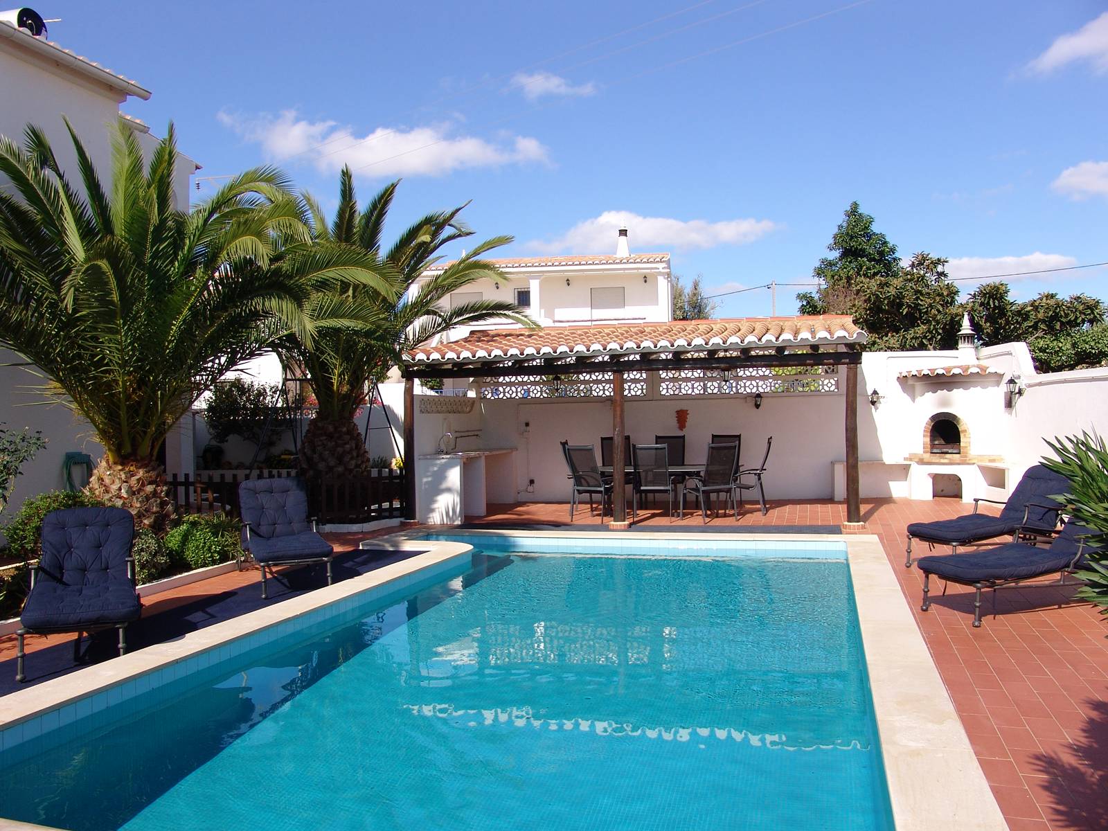 The pool and outdoor dining area
