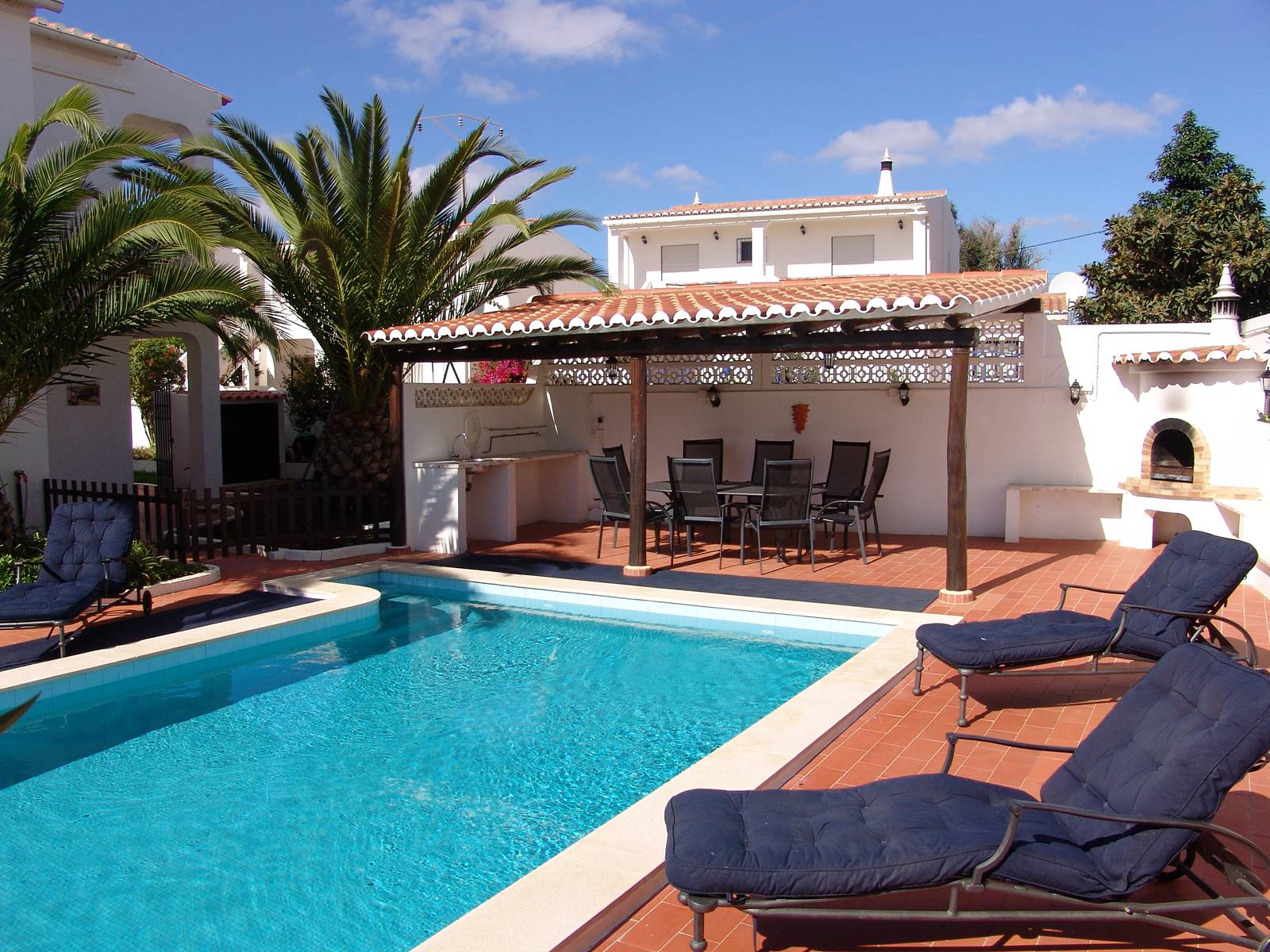 The pool and outdoor dining area