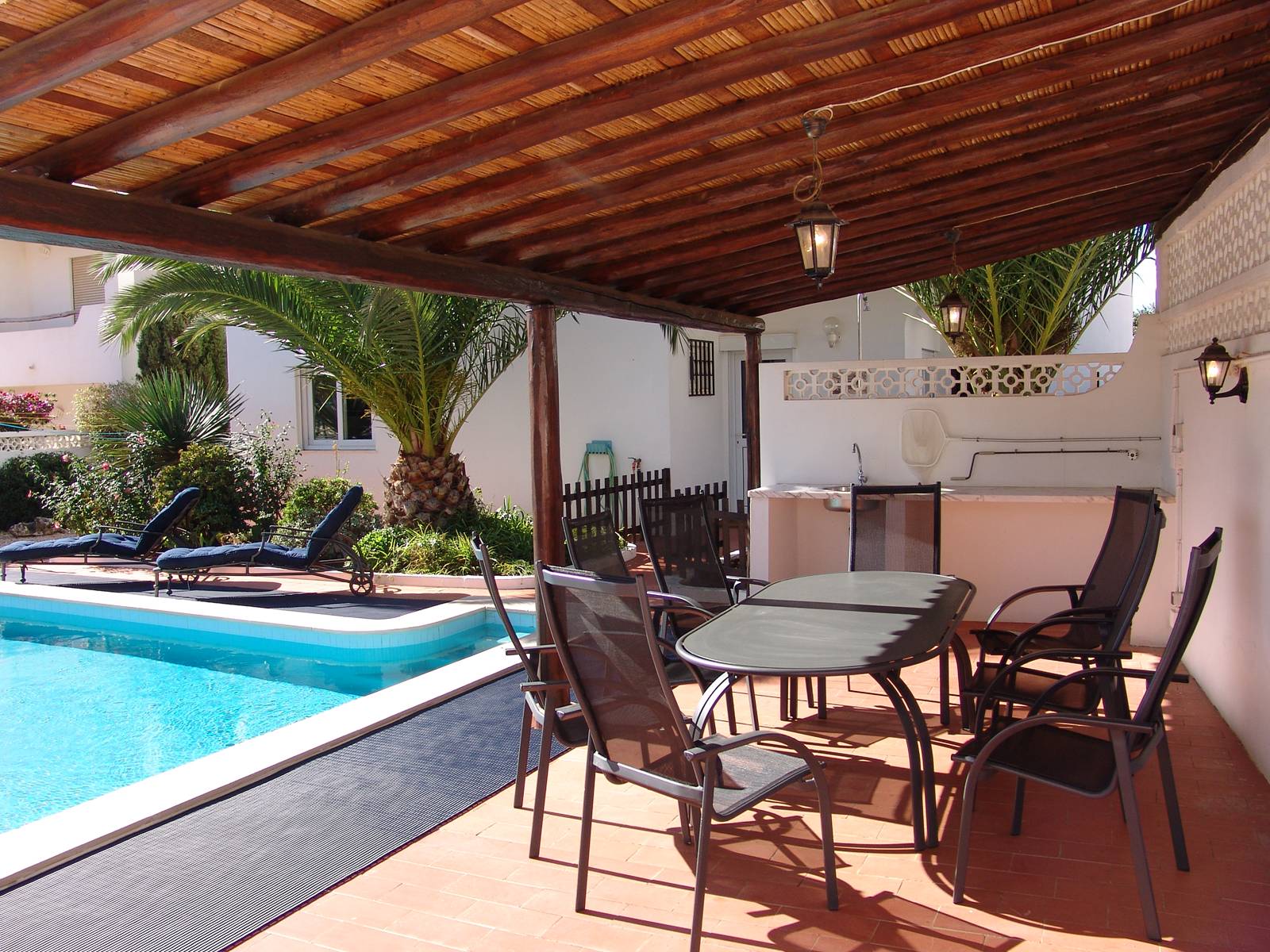 The pool and outdoor dining area