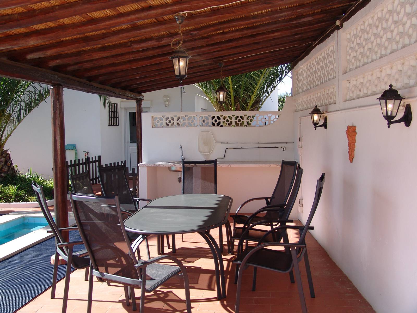 The pool and outdoor dining area
