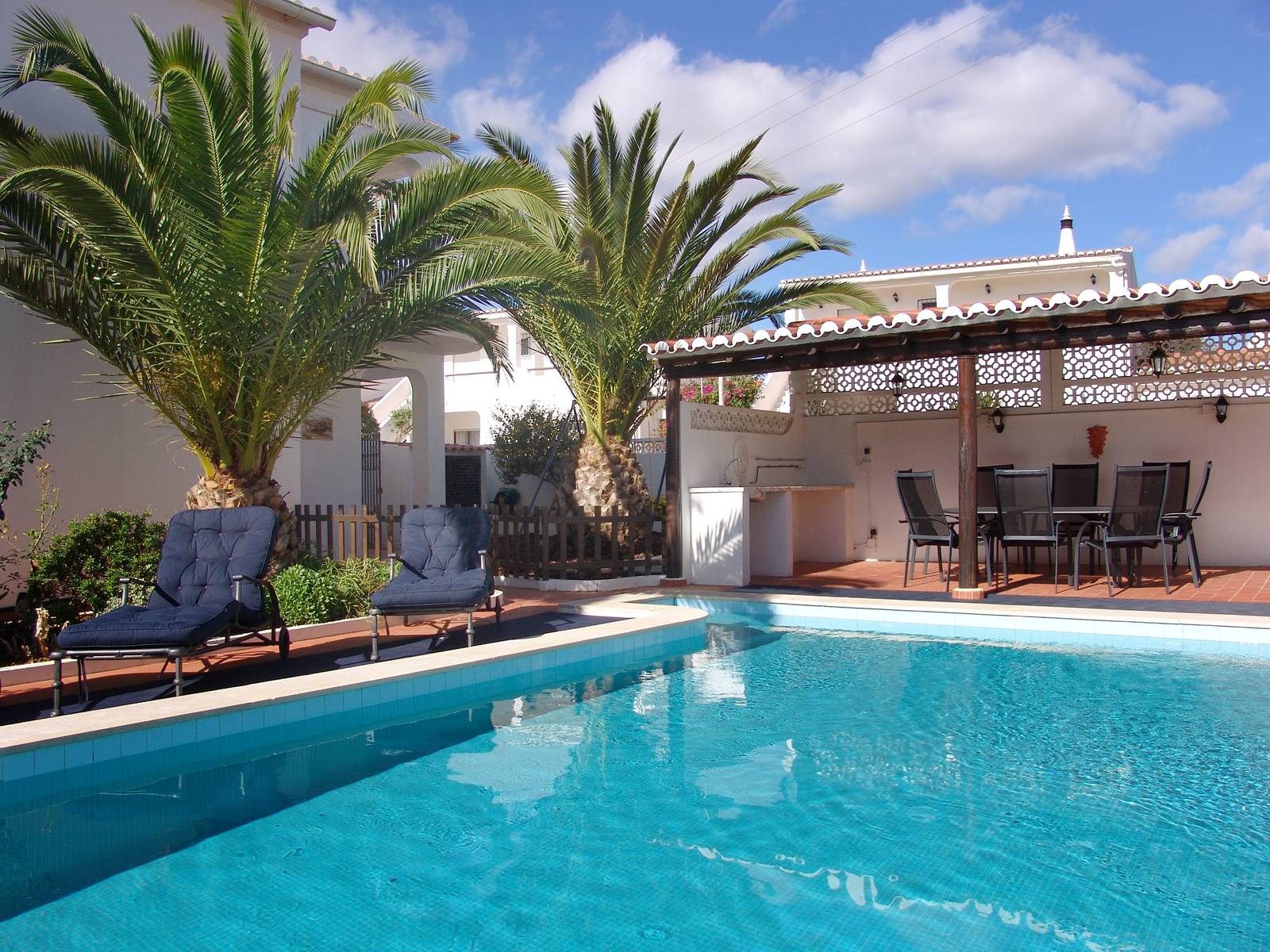 The pool and outdoor dining area